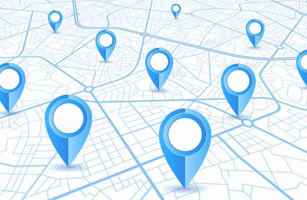 Blue GPS navigator pins on a blue roads map on white background